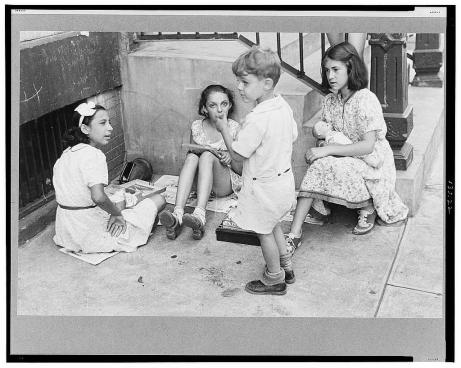 New York, New York. 61st Street between 1st and 3rd Avenues. Children playing in the street.  Library of Congress, Prints & Photographs Division, FSA/OWI Collection, LC-USF3301-006722-M1 (b&w film dup. neg.)